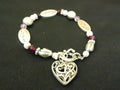 designer-fashion-bracelet-charm-metal-plastic-female-adult-silver-brown-purple-preowned 1