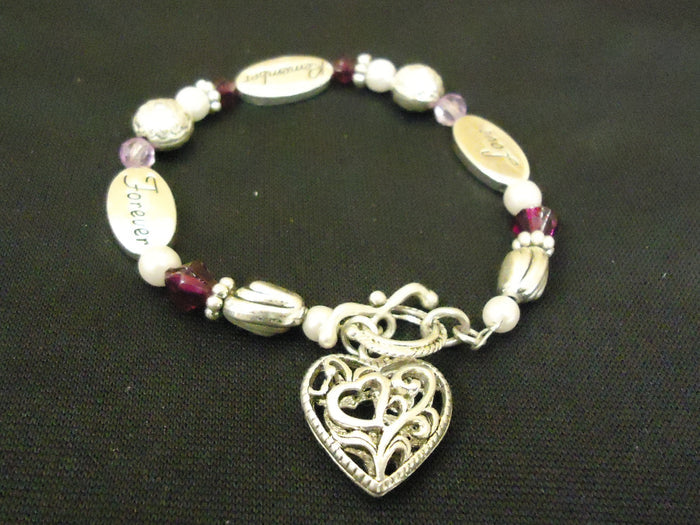 designer-fashion-bracelet-charm-metal-plastic-female-adult-silver-brown-purple-preowned 1
