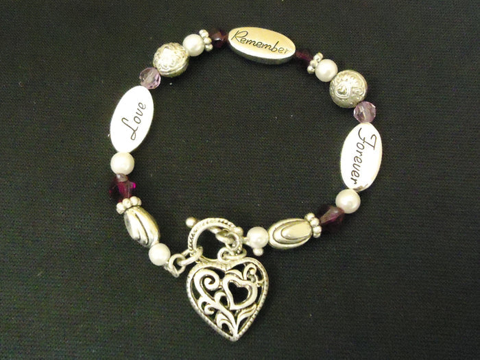 designer-fashion-bracelet-charm-metal-plastic-female-adult-silver-brown-purple-preowned 2