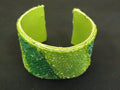 designer-fashion-bracelet-cuff-plastic-female-adult-greens-preowned 1