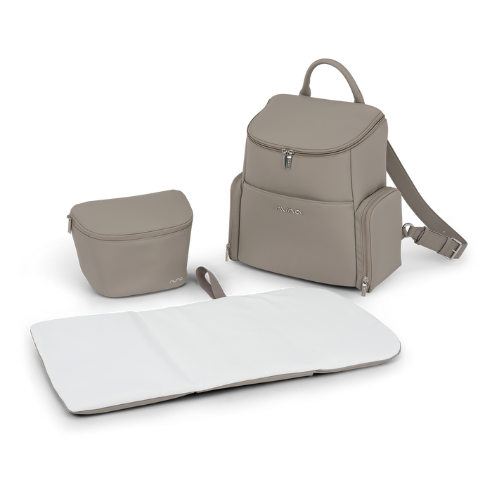 [Taupe] Set of beige bags including a backpack, small pouch, and changing mat on a white background