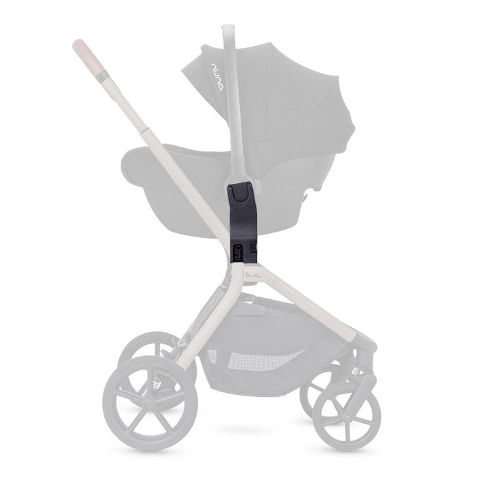 A side view diagram of a stroller highlighting a black car seat adapter attachment with the rest of the stroller faded out.